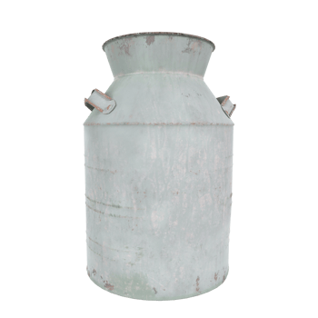 Old metal milk can used for traditional dairy farming practices png