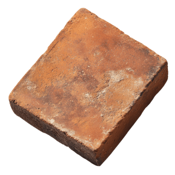 A Single Weathered Clay Brick Isolated on Black png
