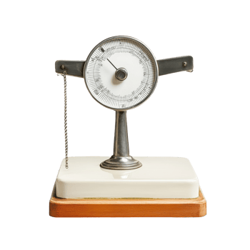 Weighing scale on a clean Transparent background showcasing vintage design and functionality for precise measurement, weighing scaleisolated on background png