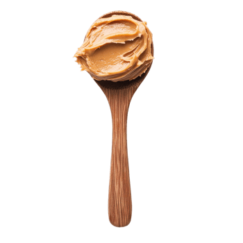 Spoon of creamy peanut butter on a wooden spoon against a Transparent background for culinary uses, Spoon peanut butter isolated on png