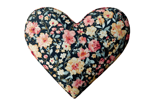 Floral heart shaped pillow, decorative home accessory, soft fabric, colorful design, perfect for cozy living spaces. png