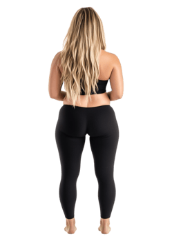 Elegant Woman in Black Leggings and Top Posing from Behind png