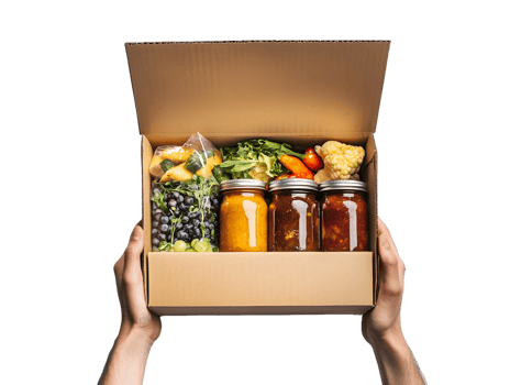 Person Holding a Box of Fresh Produce and Preserves png