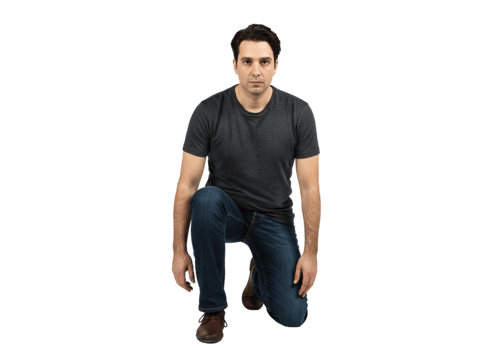 Man Kneeling Serious Expression Dark Background Studio Shot Male Pose Grey Blue Model Jeans Brown png
