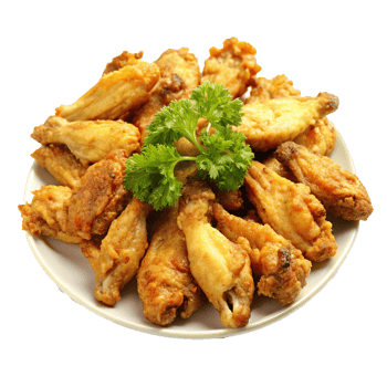 A Delicious Plate of Crispy Fried Chicken Wings with Fresh Parsley Garnish png