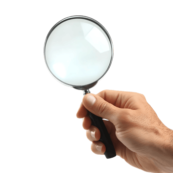 A hand holding a magnifying glass to examine details closely. png