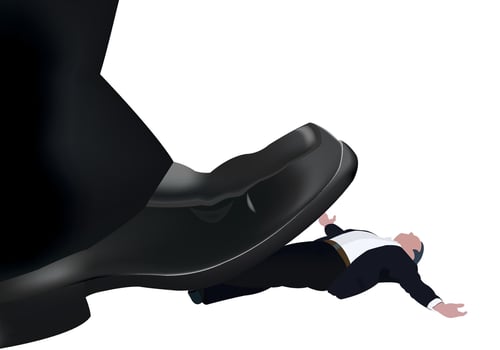 Businessman being crushed under giant foot concept for power abuse vector
