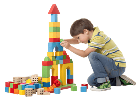 Young boy building colorful tower with blocks png