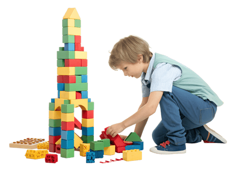 Boy builds with colorful blocks png