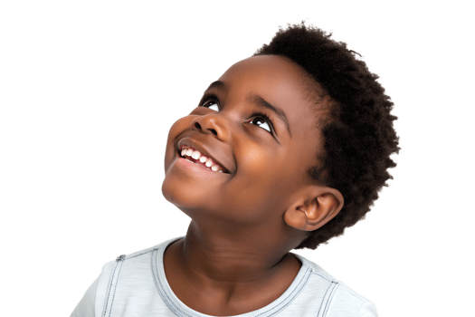 Young boy smiling and looking up with joy png