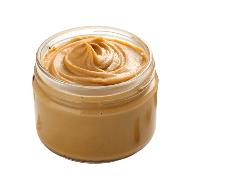 Creamy peanut butter in a glass jar png