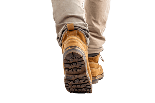 Walking away in sturdy hiking boots on a pathway png
