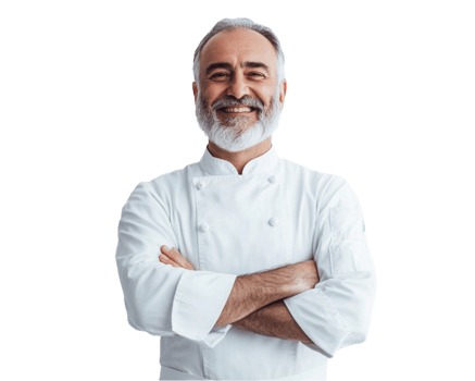 A smiling middle-aged European chef with a gray beard, wearing a white uniform, standing png