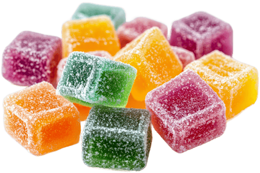 Colorful fruit gummies stacked in a sweet display png