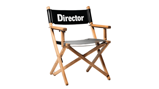 Director's chair with black canvas and wooden frame in a studio environment png