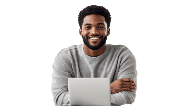 Smiling man working on laptop at home office png