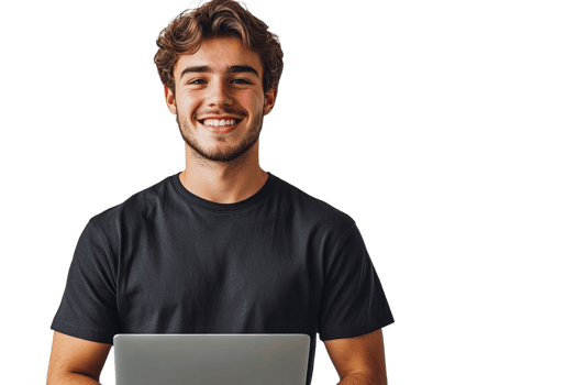 Young man smiling while using a laptop indoors png