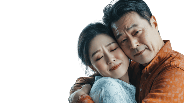 Couple sharing a warm embrace indoors, expressing love and connection in a bright setting png