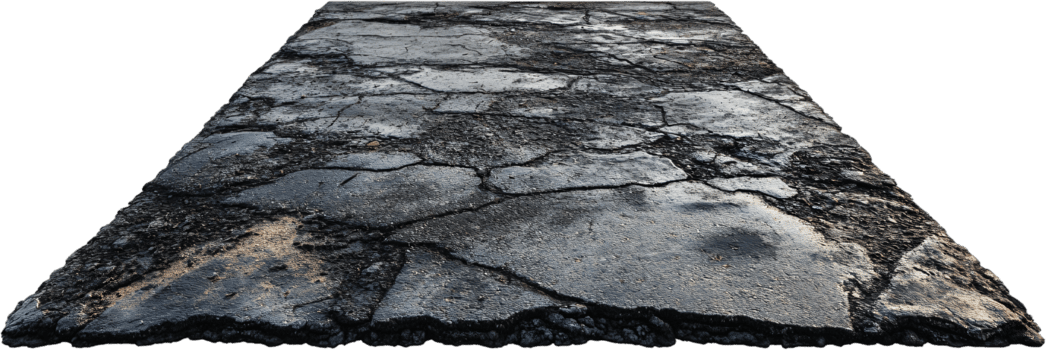 Worn and weathered asphalt road surface displays extensive cracking, demonstrating significant wear and the need for maintenance or repair. png