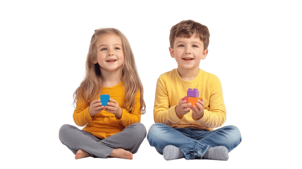 Smiling children play with colorful building blocks while sitting on the floor in a bright indoor environment png