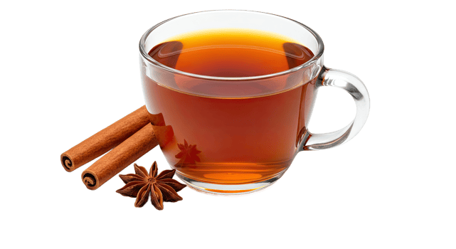A glass of tea with cinnamon and an anise png