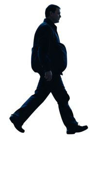 Silhouette of a man walking in the dark. png