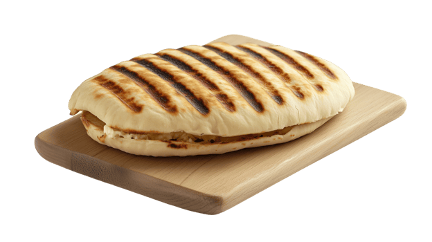 Grilled sandwich on a wooden cutting board png