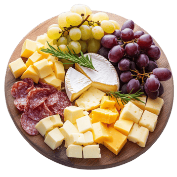Round wooden cheese platter with grapes assorted cheeses and cured meats png