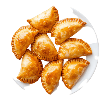 Golden empanas neatly arranged on white plate png