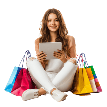 Happy young woman seated on the floor enjoying online shopping with colorful bags around her, file no background Happy young woman shopping online png