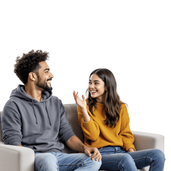 A man and woman sitting on a couch and talking png