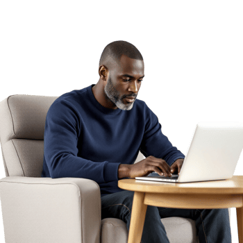 A man sitting in a chair with a laptop png