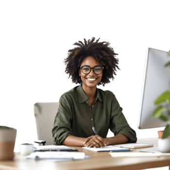 A smiling woman in glasses sits at her desk png