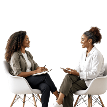 Two women sitting in chairs talking png
