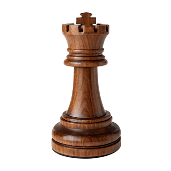 Beautifully crafted wooden chess king piece with a focus on its details set against a blurred chessboard with pawns and other pieces png
