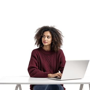 A woman sitting at a table with a laptop png