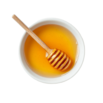 Bowl of golden honey with wooden dipper resting on a transparent surface showcasing natural sweetness, Honey in bowl on transparent background png