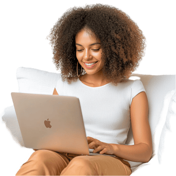 Woman smiling while working on a laptop png