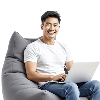 A man sitting on a bean bag chair with a laptop png