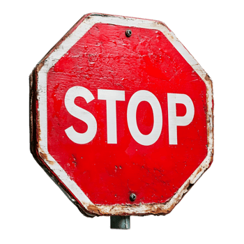 Prominent Red Octagonal Stop Sign Alerting Drivers to Obey Traffic Regulations on Urban Street png