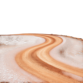 Winding Red Dirt Road in Desert on transparent background. png