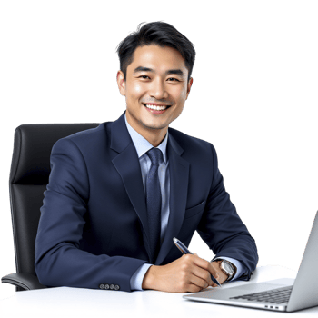 Asian businessman sitting at desk with laptop png
