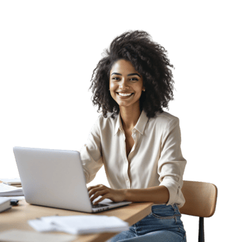A smiling woman with curly hair sitting at a desk with a laptop png