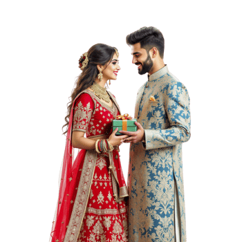 An indian couple in traditional attire holding a gift png