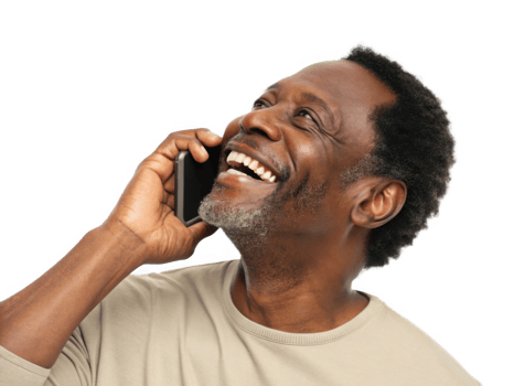 Happy African American man smiling while using cell phone, expressing joy and connection png