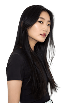Charming and Fashionable Asian Model with a Warm Expression and a Confident Look in a Chic Outfit png