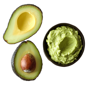 Freshly cut avocado with creamy spread on a light textured surface, Avocado, cut avocado and avocado spread png