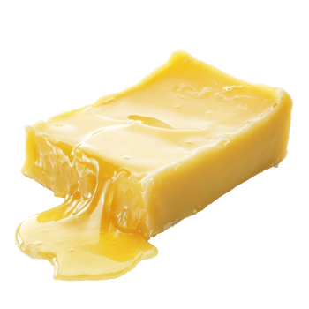 Melting butter slowly oozing on a reflective surface perfect for culinary presentations, A piece of melting butter isolated png