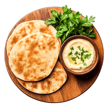 Freshly Baked Flatbreads with Hummus and Fresh Herbs Plate png