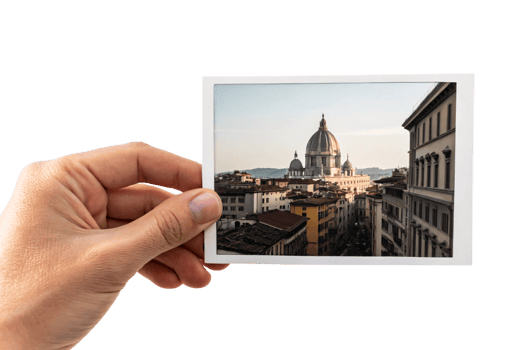 A hand holds a photo showing Florence's iconic Duomo, with scenic architecture and a warm sunset glow highlighting the city's historical charm png